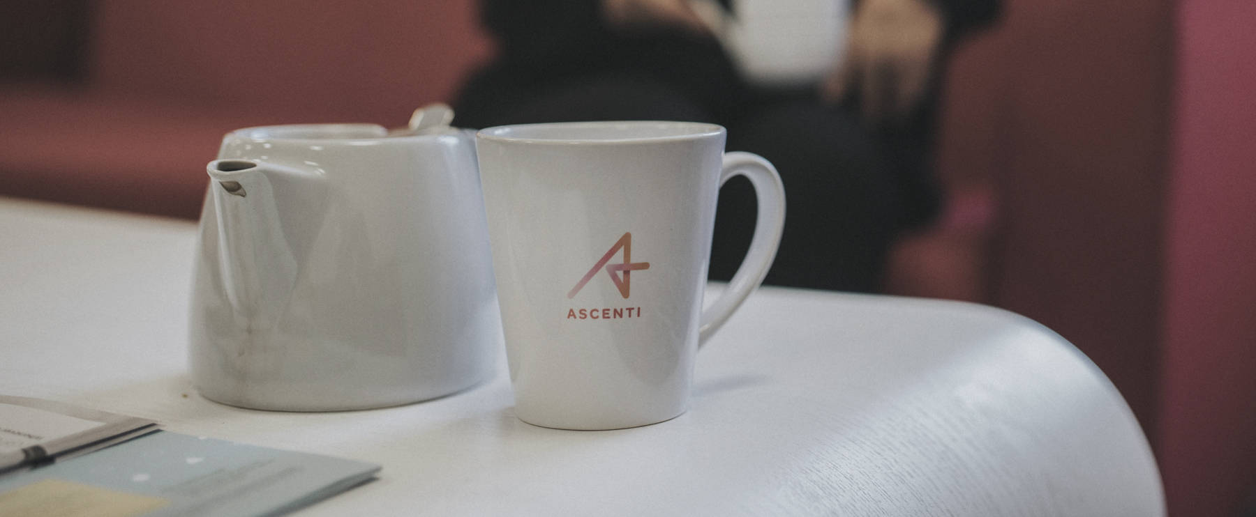 Photograph of Ascenti branded mug and teapot