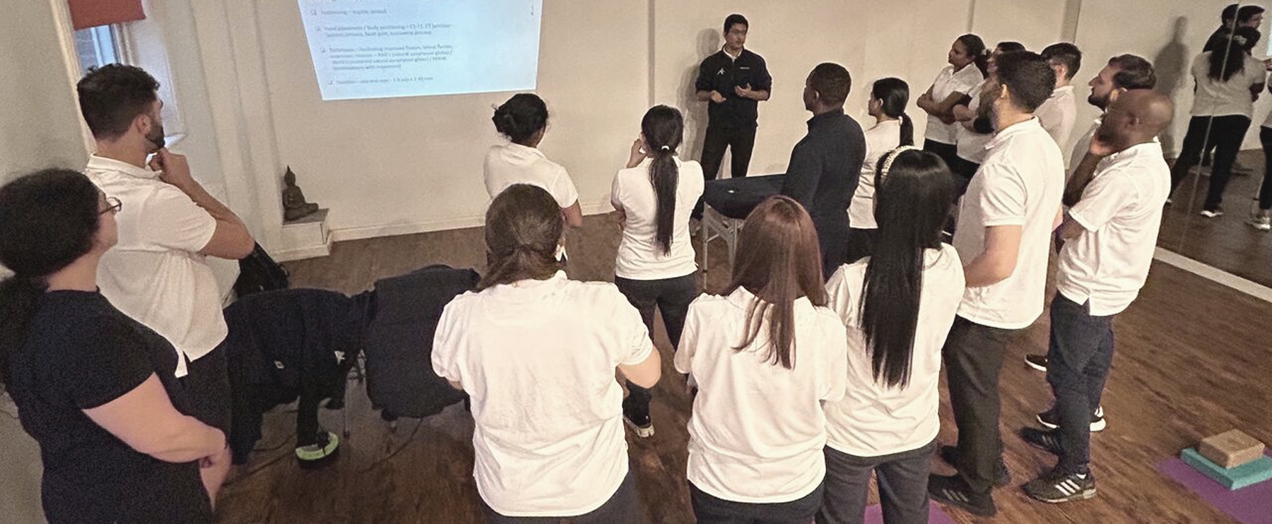 Photograph of lots of Ascenti physiotherapists attending group training session