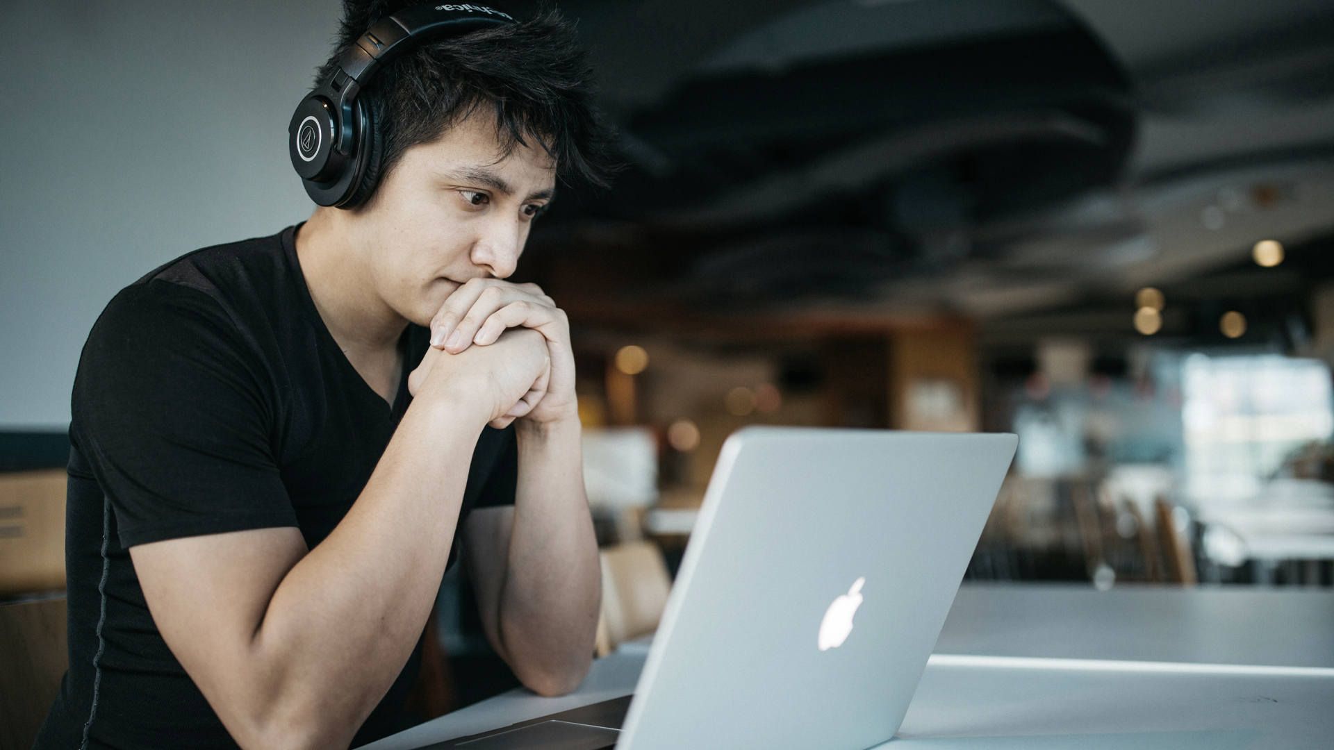 Photograph of man with laptop